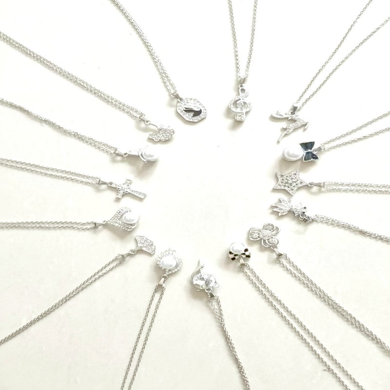 Collana elegante con micro inlay a forma di cuore e goccia_voghion.com