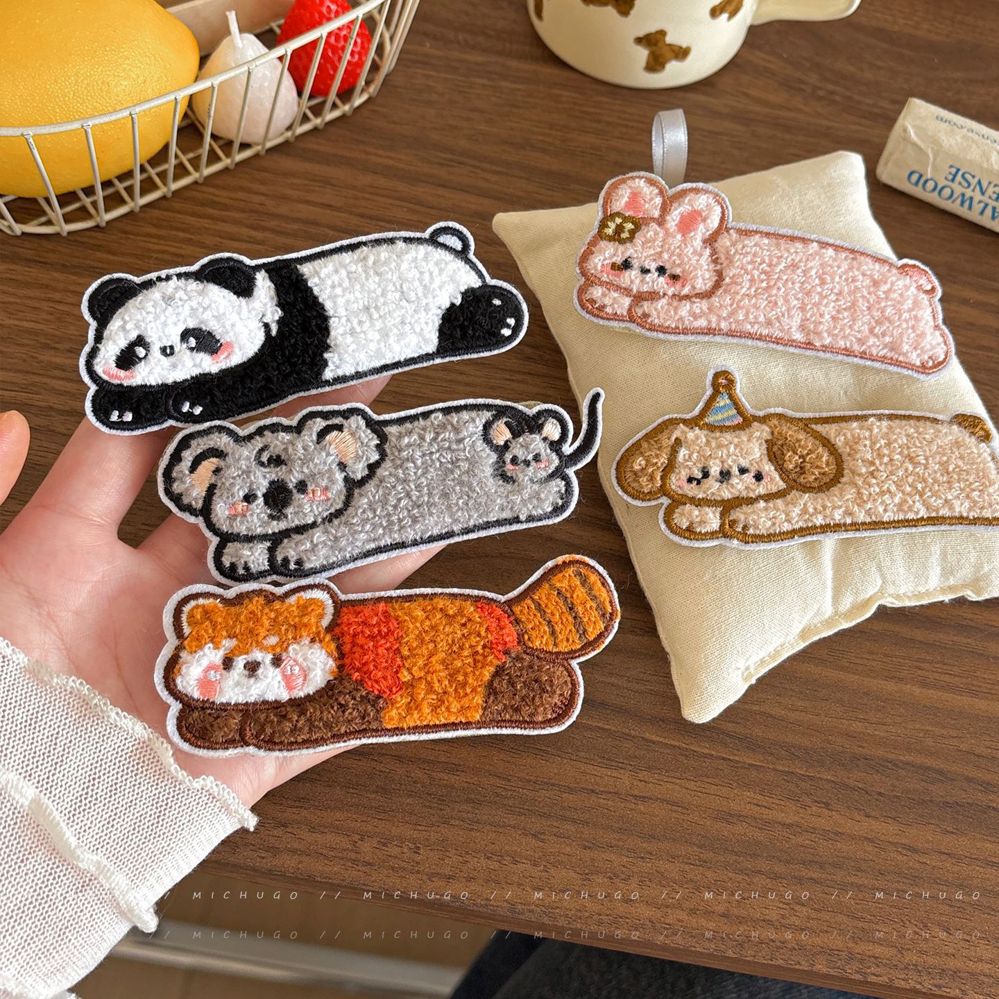 Cute plush raccoon hair clips, perfect for girls, to keep stray hairs in place and create a neat, seamless look for bangs; also available as a small bunny hair accessory