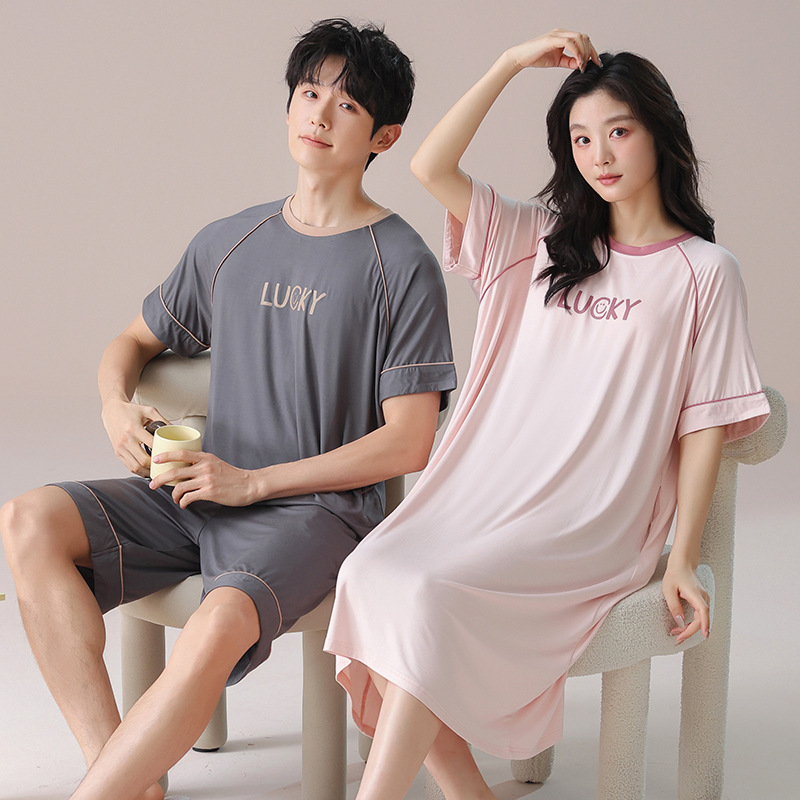 Pareja pijama de mangas cortas mujeres sin sujetador de verano moda pijama de seda de hielo hombre pantalones cortos de mangas cortas set de ropa para el hogar