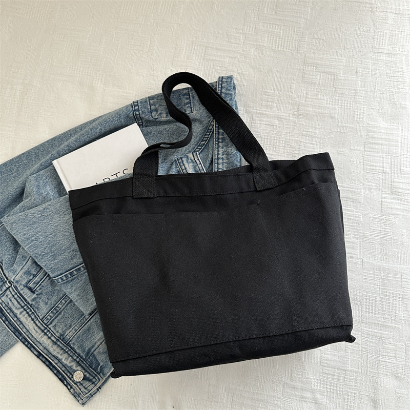 Invierno nuevo paquete de gran capacidad 2024, popular este año bolsas ociosas coreanas, bolsas de hombro de lecciones de reparación