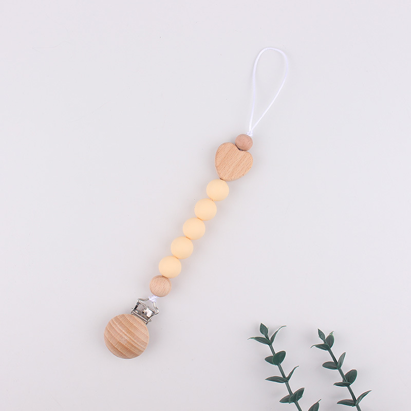 Clip de tetina de tres agujeros redondo de beech para calmar al bebé tetina de silicona de goma de diente anti-caída cadena