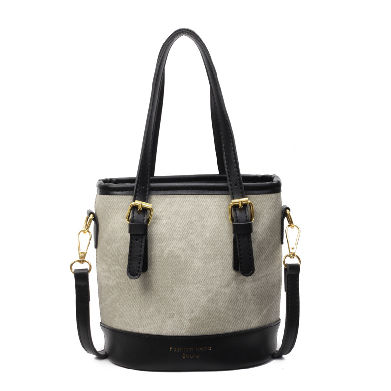 Bolso de mano de color de contraste de comercio exterior para mujer 2025 nuevo bolso de cubo de ocio salvaje simple bolso de mensajero de un solo hombro de alta gama