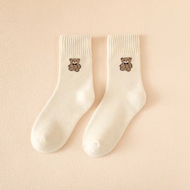 Oso Otoño e Invierno calcetines cálidos al por mayor de las mujeres a media pantorrilla forrada de lana engrosada resistente al frío Terry calcetines toalla Calcetines de piso