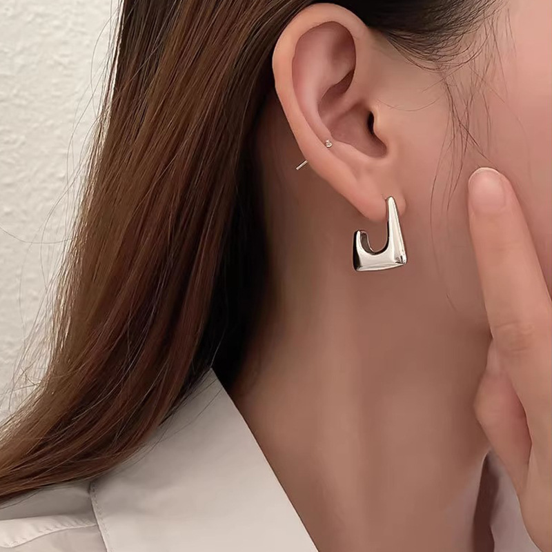 S925 aguja de plata elegante pendientes de nicho femenino diseño de gama alta pendientes populares pendientes de perlas pendientes únicos al por mayor