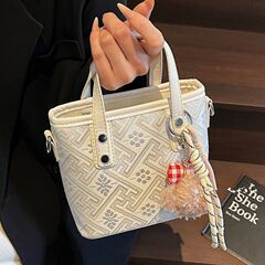 夏季流行爆款小包包女2025新款时尚单肩斜挎包超火手提水桶包手工