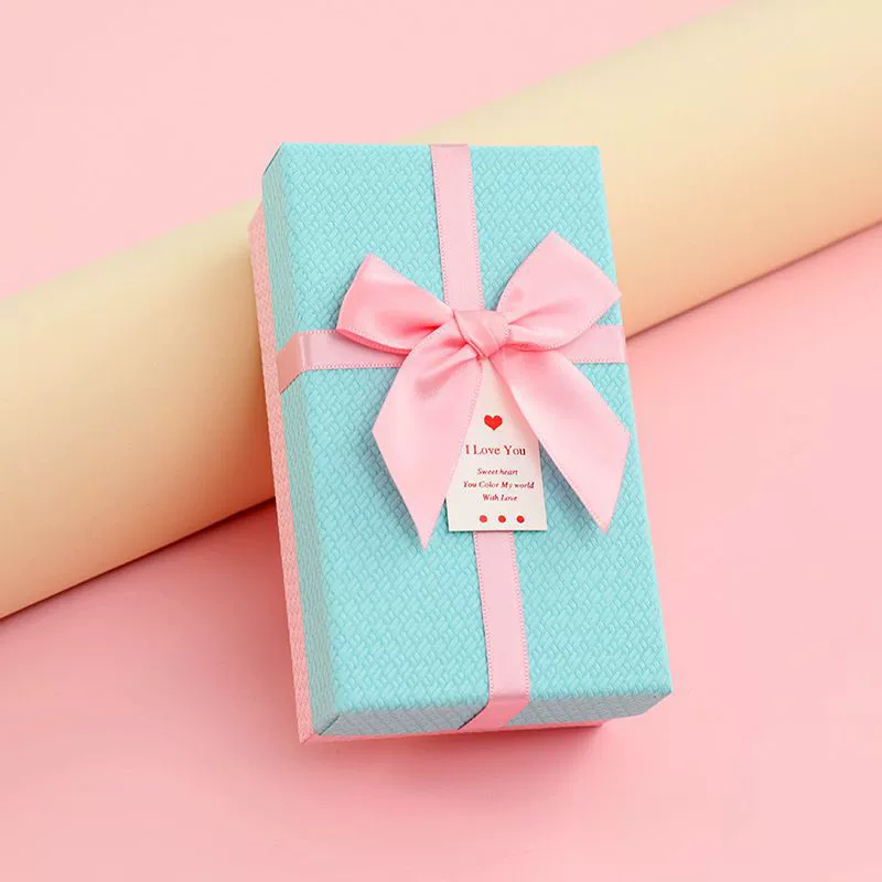 Rectangular lipstick with bow, cosmetic perfume, gift box