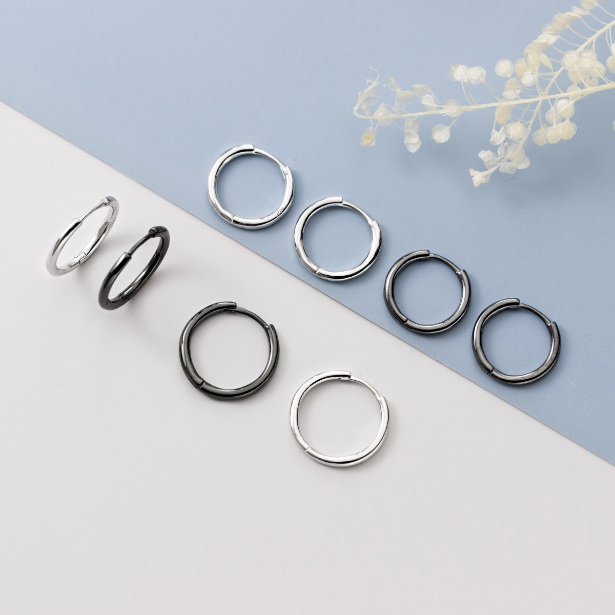 Eloch S925 plata moda moda hombre y mujer en la calle simple con líneas brillantes botones de orejas redondas M05958