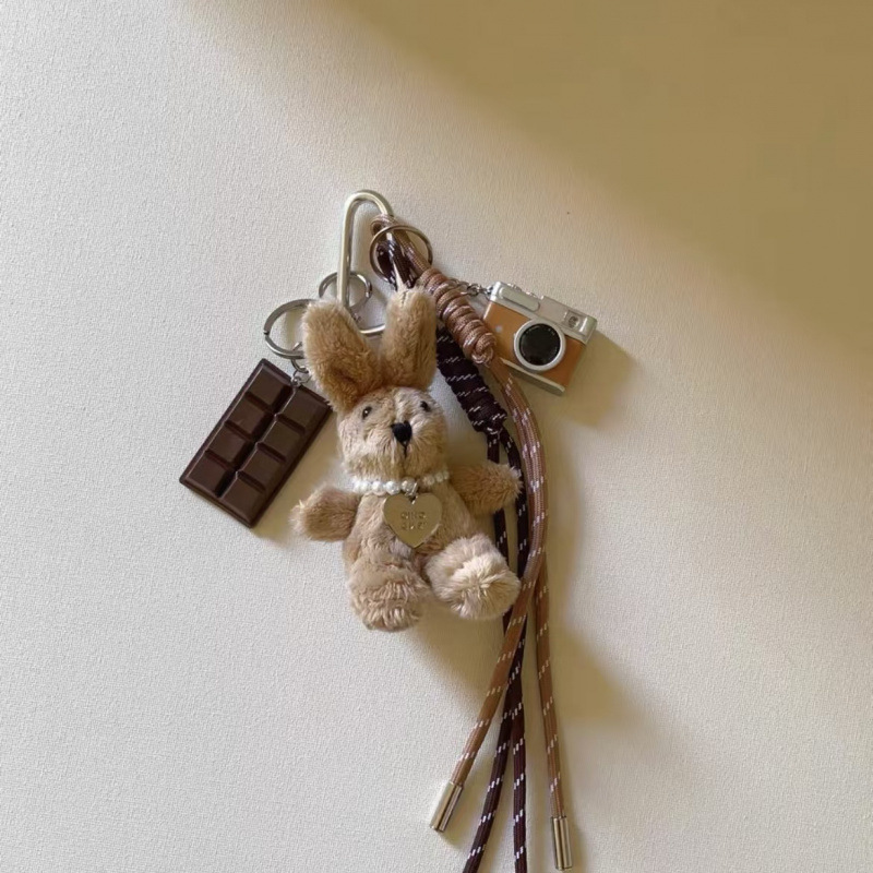 Bolsa de viento, bolsa de colgante, muñeca de viento, cuerda de nylon colgante, conejo, cachorro, cámara, llavero, mochila escolar