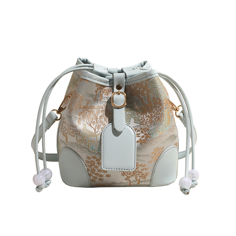 Nationalt nichedesign super populær vestlig bucket-taske, ny kinesisk stil 2024 enkelt skulder crossbody-taske_voghion.com