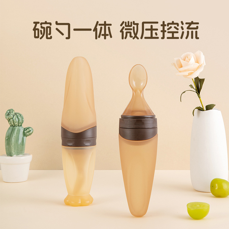 Bowl and spoon integrated food grade liquid silicone squeeze rice paste bottle feeding baby complementary spoon rice paste bottle manufacturers