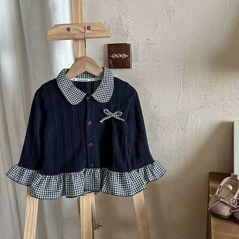 2026 primavera nueva camisa de cuello de muñeca de cuadrícula de mangas largas de encaje arco de camisa de estilo occidental para niños