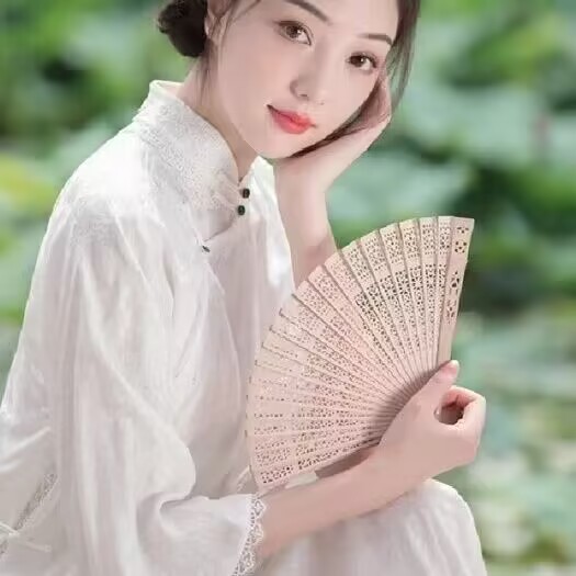 Dark gray sandalwood fan