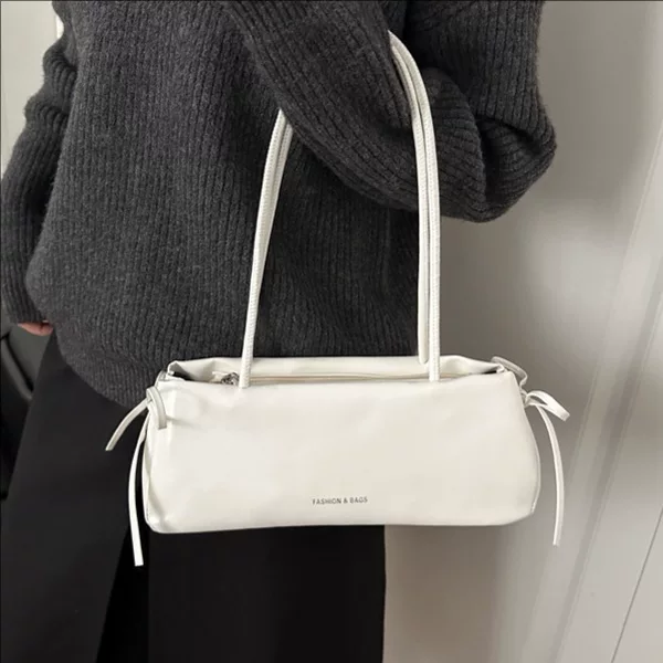 High-End Bags for Women 2026 Spring New Commuter Underarm Bag Fashionable Simple Niche Design Single-Shoulder Baguette Bag