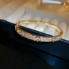 Golden bracelet, flowered
