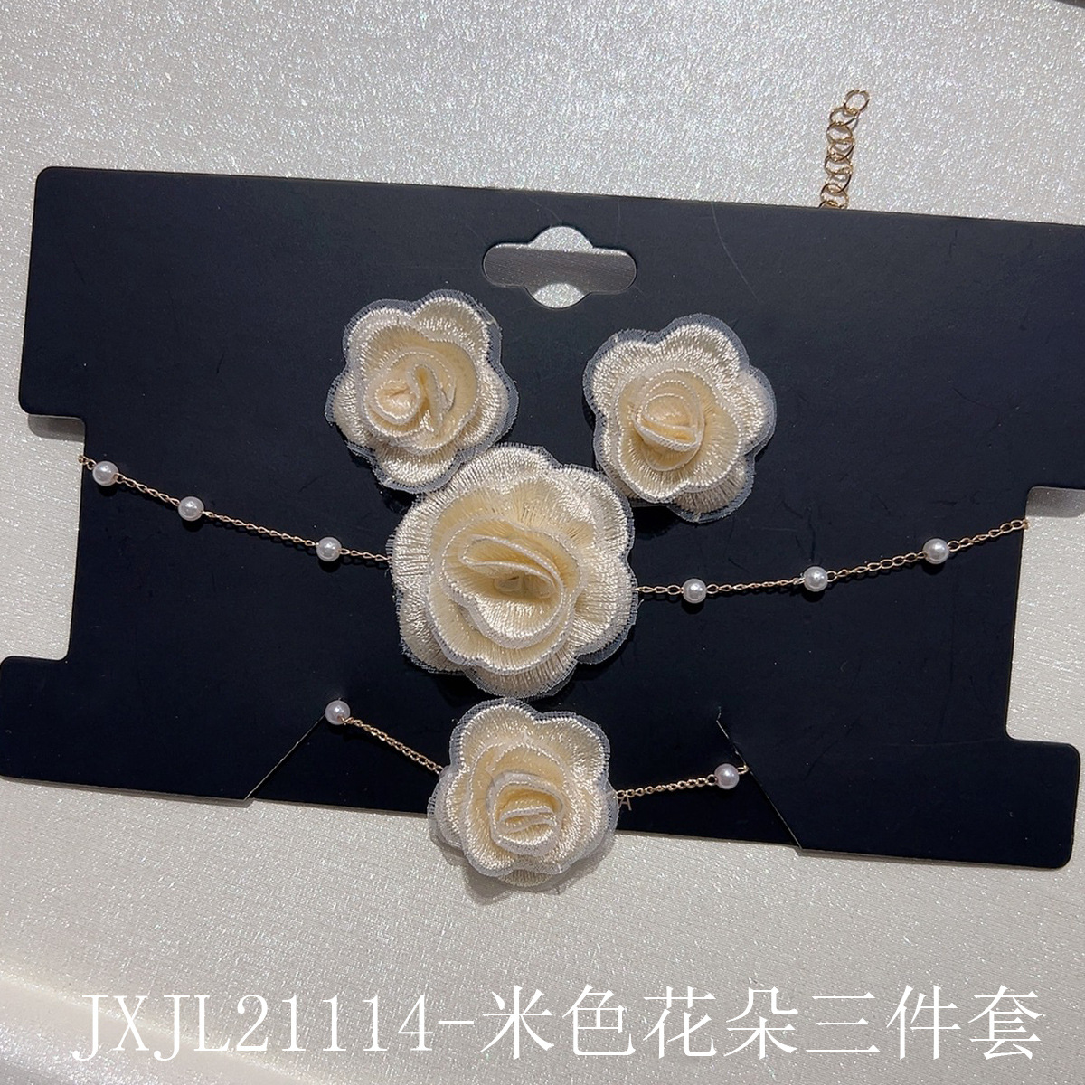 JXJL21114-米色花朵三件套.jpg