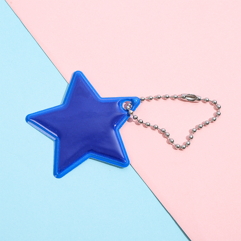 Llavero Colgante Reflectante de Estrella de PVC para Mochila Escolar y Ciclismo