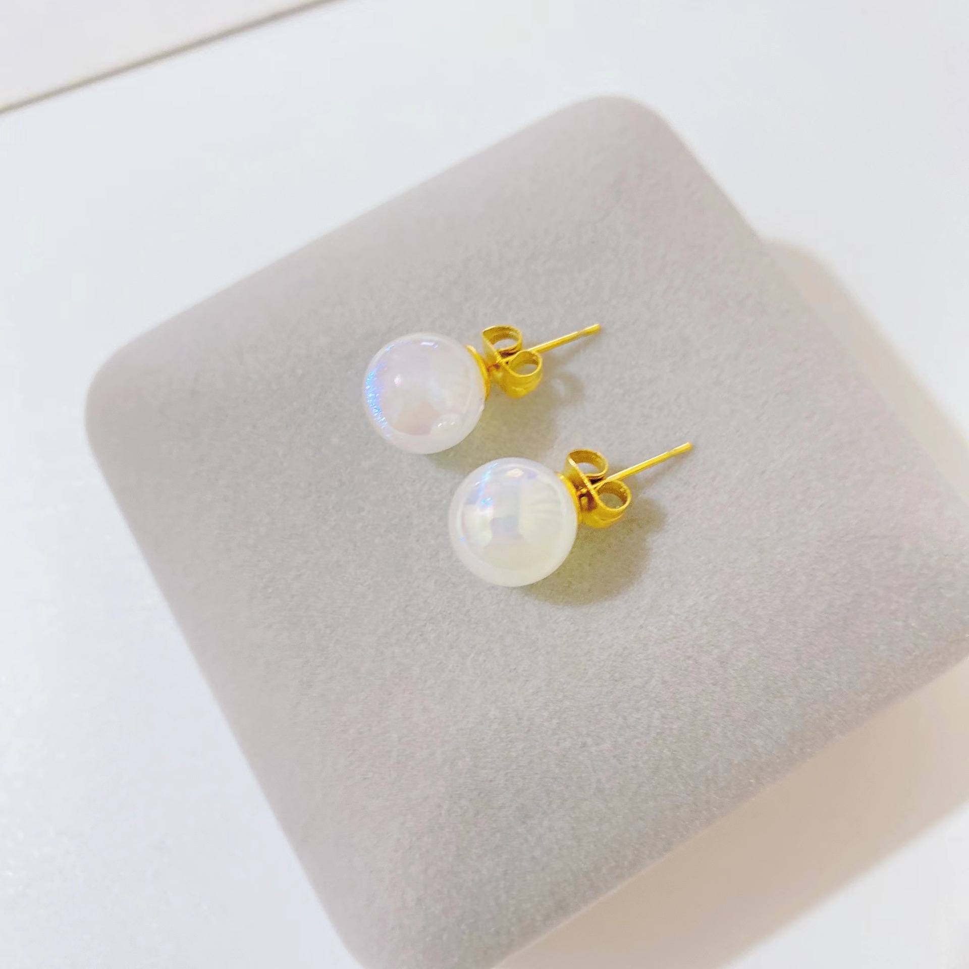Fashion Transparent Fine Flashing Colorful Pearl Titanium Steel Earrings display picture 4