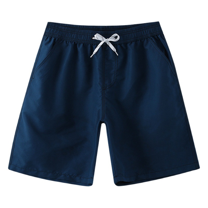 Pantalones cortos de playa para hombre, pantalones cortos de color sólido, pantalones cortos de baño de secado rápido, pantalones cortos deportivos informales y holgados para vacaciones en aguas termales.