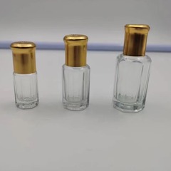 カラーガラスの小さいボールの玉のボールの金の蓋の精油の瓶の蜂蜜の瓶の八角の瓶の化粧品の瓶の分注の瓶
