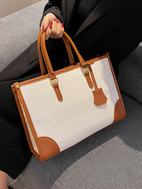 Bolso Tote portátil transfronterizo de gran capacidad para mujer 2025 nuevo modelo retro patrón de piedra contraste bolso de mensajero de hombro de viajero