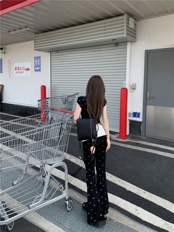 蝴蝶结镂空辣妹短袖T恤女夏季设计感套装撞色微喇叭休闲裤两件套|undefined