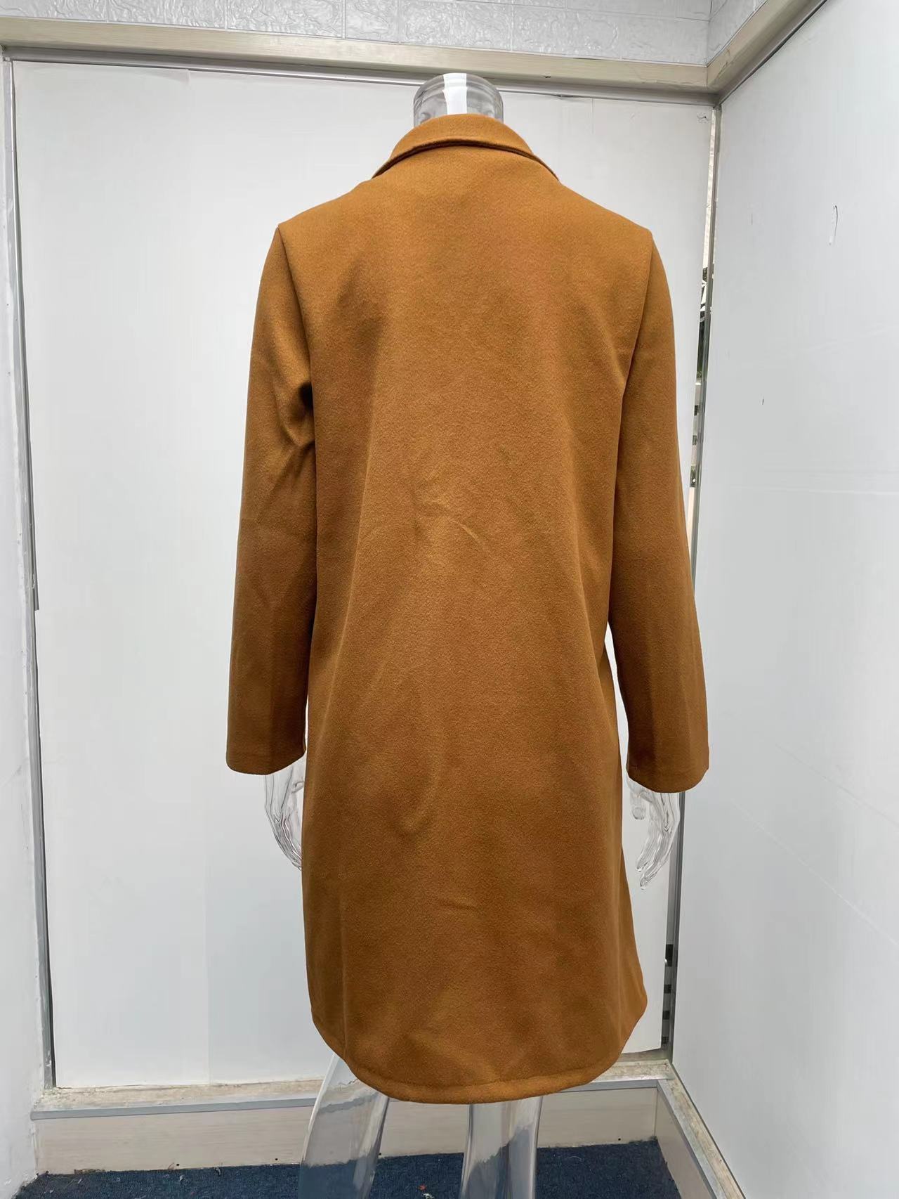 Title 19, Mid-length coat with solid lapels. Classic styl...