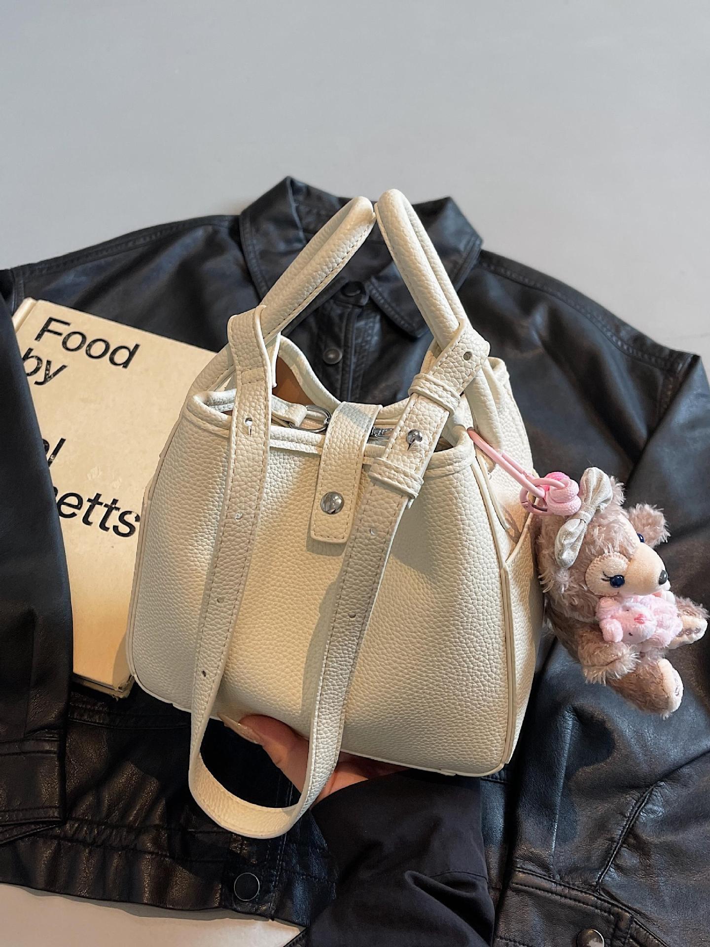 Venta caliente de comercio exterior bolso de cubo de verano mujer 2025 bolso de canasta de verduras de mano nueva tendencia bolso de mensajero de alta gama de todos los partidos