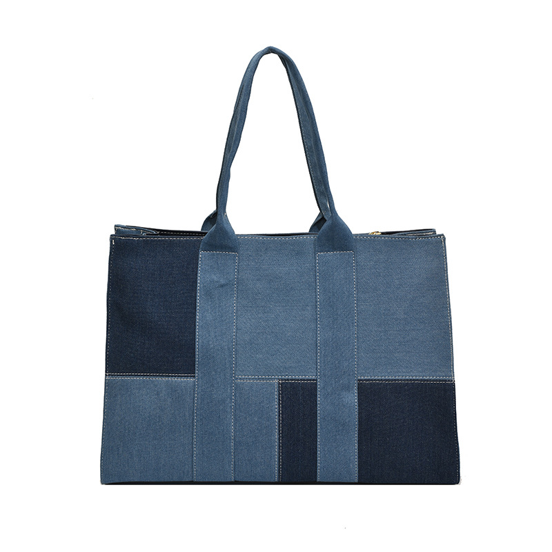 Bolso de denim de gran capacidad para mujeres 2025 nuevo color de moda mochila de hombro de viaje ocio bolso de tote de color