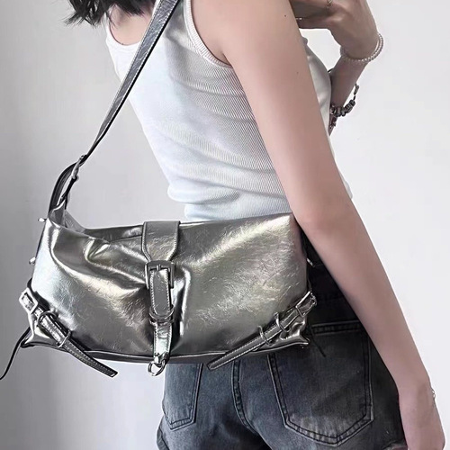 A trendy, versatile workwear crossbody bag in silver matte mirror finish with dopamine accents, perfect for matching a single-shoulder bag and taking photos on the go.