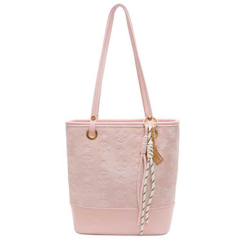 Bolsa de cubo de moda coreana para mujeres 2025, nuevo diseño universal de nicho para viajar bolso de hombro de moda bolso de mujer casual