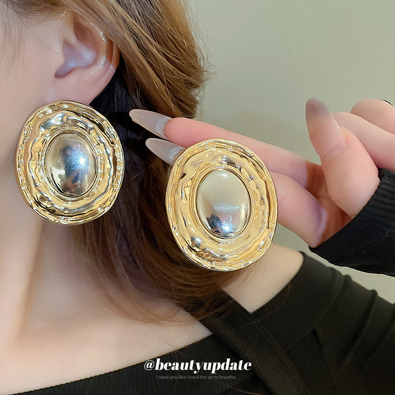 Pendientes elípticos exagerados transfronterizos de metal con aguja de plata Pendientes de moda de nicho europeo y americano Pendientes de lujo ligero simples y de alta gama mujeres