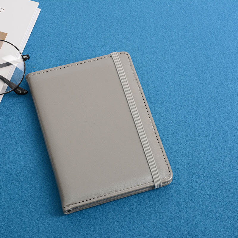 Clip de pasaporte de PU de punto caliente transfronterizo RFID paquete de tarjeta de oro rosa cubierta de visa de turista almacenamiento multicapa de alta calidad y bajo precio