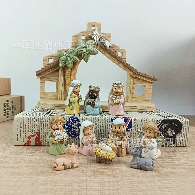 Conjunto transfronterizo de 11 regalos de Navidad dibujos animados Nacimiento del grupo de ornamentación con árboles de jable decoración de resina para el hogar
