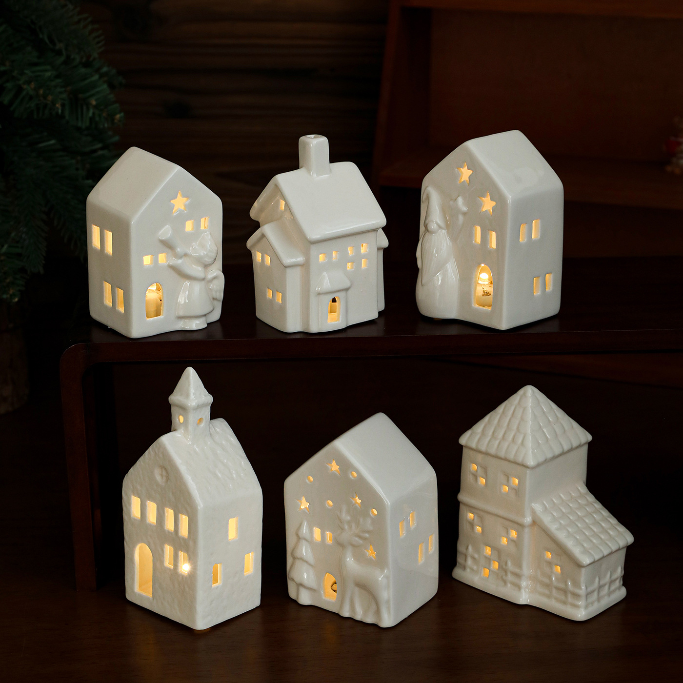 Nuevos productos transfronterizos decoración de cerámica luminosa casa de Navidad casa de estilo europeo hueco decoración de mesa lámpara de noche luz de atmósfera en stock