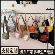跨境外贸时尚新款百搭斜挎单肩包高级感帆布包休闲小众通勤饺子包