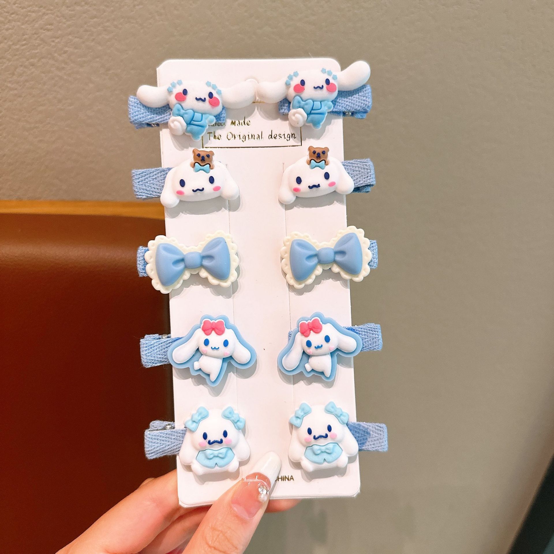 Tombro de bebé femenino Dibujos animados tela todo incluido horquilla para niños 2024 nuevo conjunto de horquillas de gaviota Sanli accesorios para el cabello