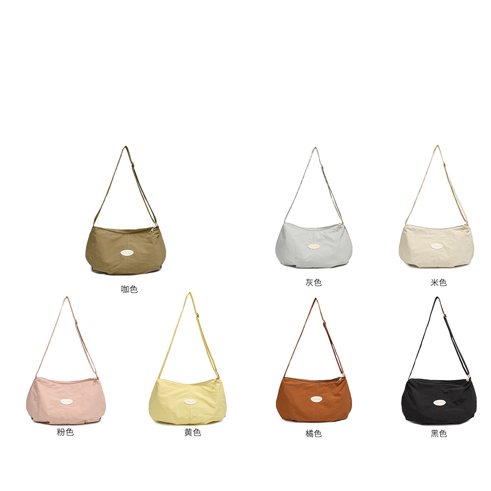 Bolso de color sólido universal 2025, nuevo bolso de bolsas de bolsas de bolsas de moda de hombro, mochila de viaje casual para hombres y mujeres.