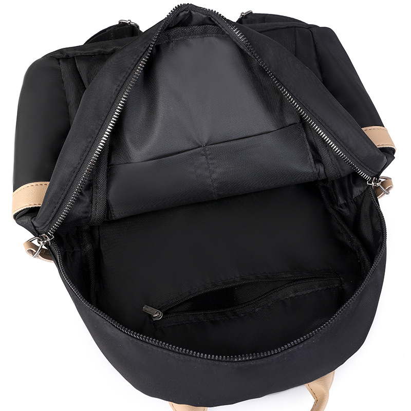 2024 verano nuevo estilo coreano damas mochila de nailon moda color contraste ligero mochila de viaje al aire libre al por mayor