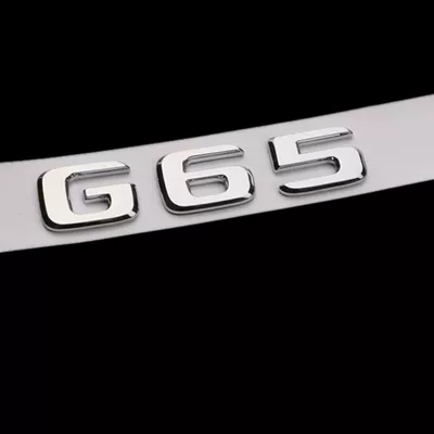 Car logo: lettering, tail emblem, V8 side emblem