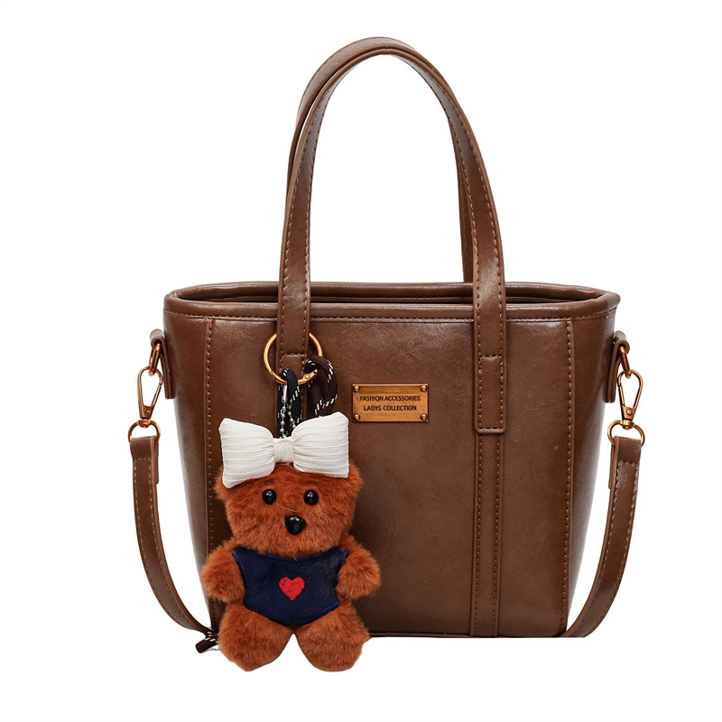 Bolso de mano retro de alto nivel, bolso de balde de agua universal, mujer, otoño y invierno 2025, nuevo tipo de bolso de hombro de moda, bolso de transporte de viaje