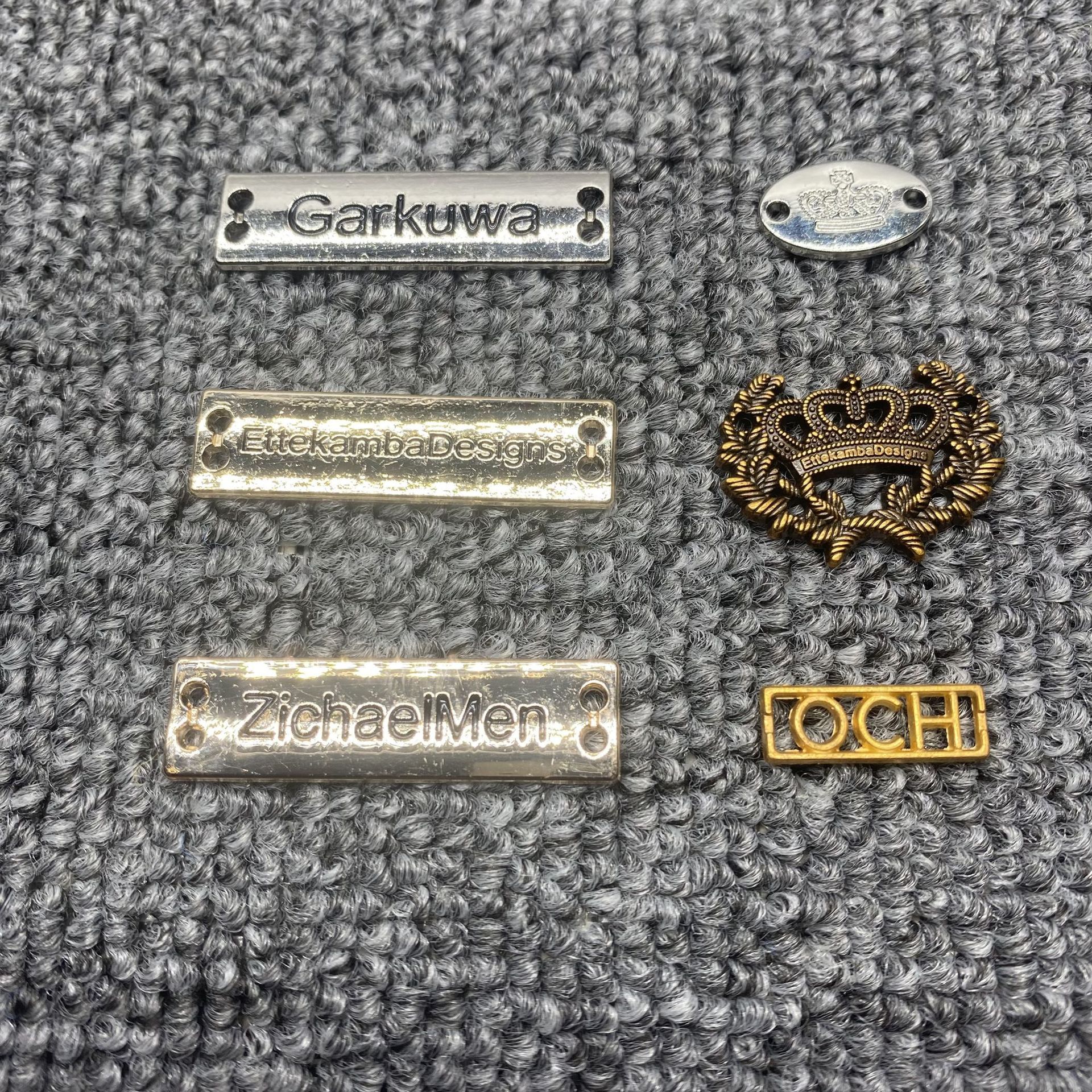 定锌合金批发服饰服装箱包五金辅料金属商标手缝标字母logo椭圆小