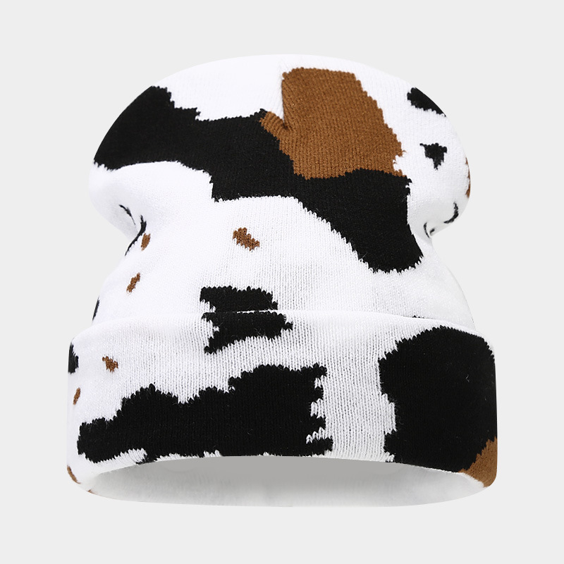 Moda europea y americana Nueva leopardo Jacquard sombrero de punto engrosado cálido hombres y mujeres otoño e invierno Gran circunferencia de la cabeza protección del oído sombrero de lana
