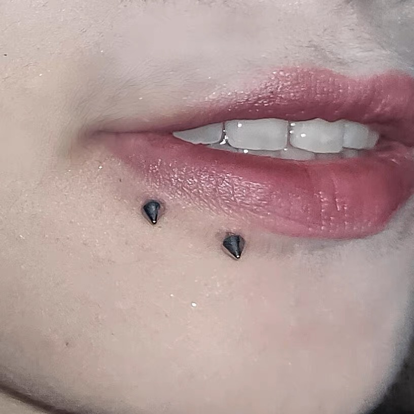 Labret stud lip piercing jewelry styling detail