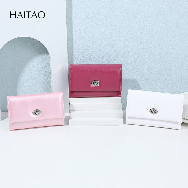 Nuevo tipo de billetera de mujer transfronteriza tres plegables cera de aceite billetera de cuero de gran capacidad multi-tarjeta de alta calidad billetera de cambio para mujeres