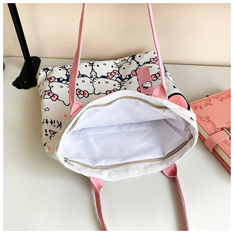 The new fashionable cartoon canvas bag, simple and versatile tote bag, cute commuting single-shoulder tote large bag, is selling well across borders undefined