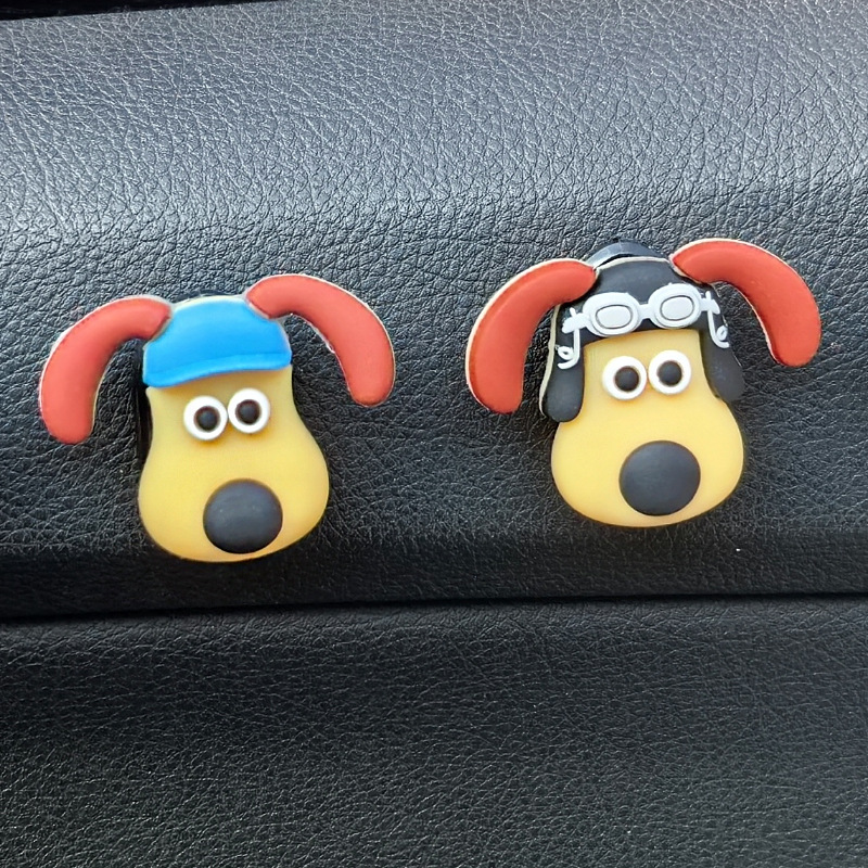 La cabeza de la celebridad de Internet, la batería del coche, el gancho del coche, el gancho pequeño del coche del copiloto delantero, los accesorios del coche