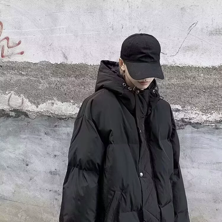 Winter travel trend down jacket with hood, oversize