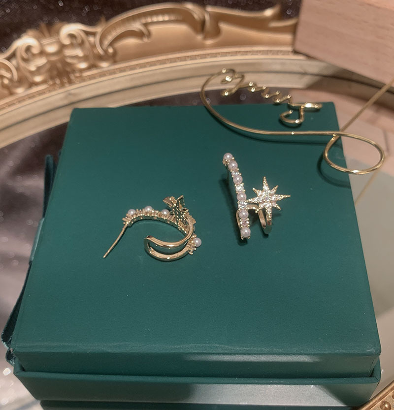 Fashion Rice Eight-pointed Star Earrings display picture 1