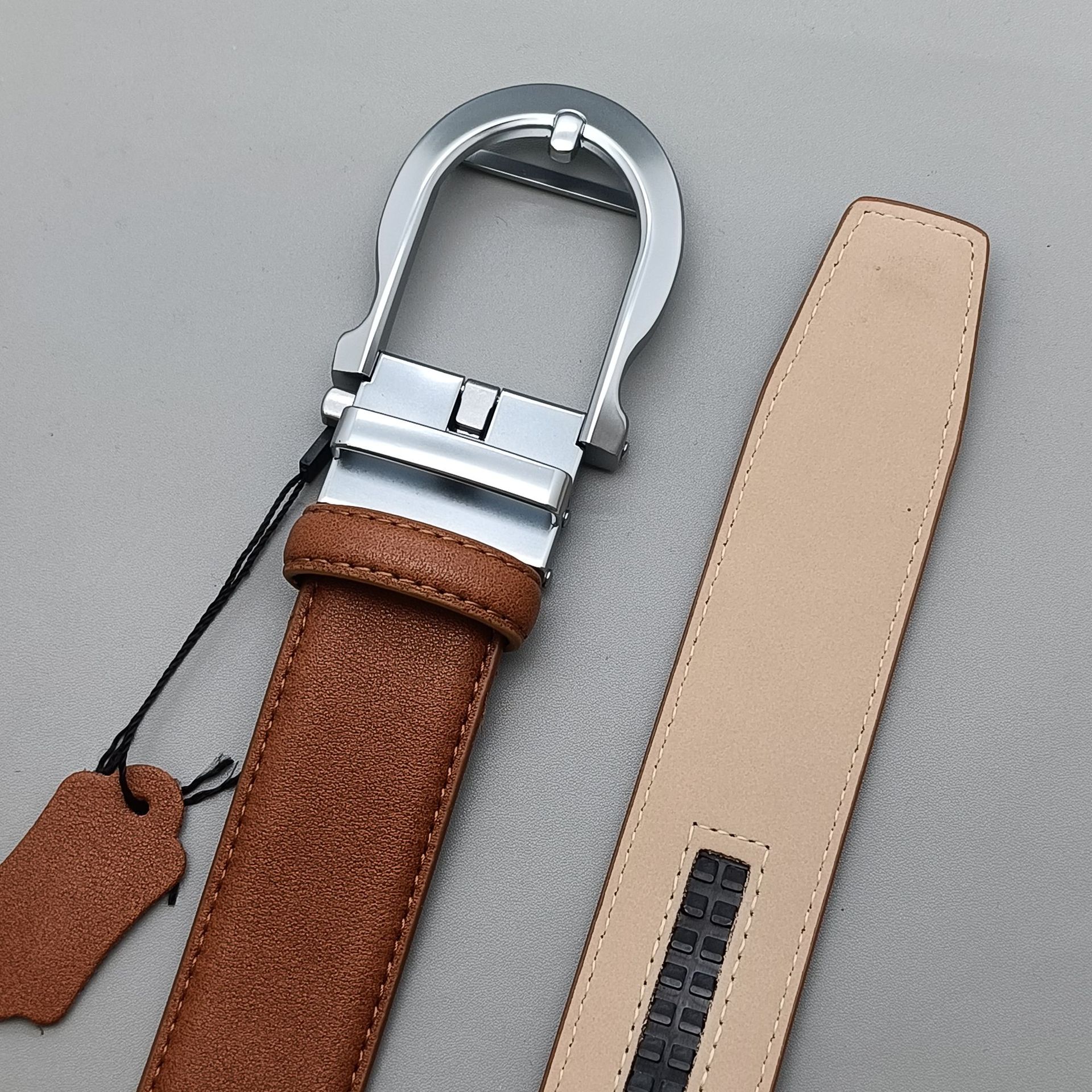 Brown stitching + silver buckle