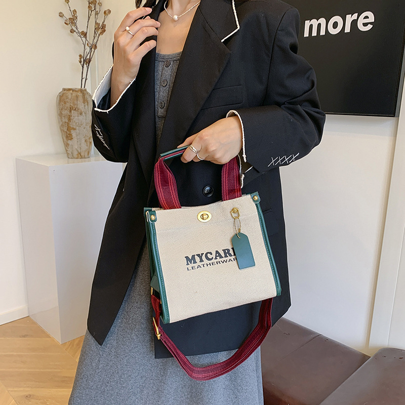 Gran capacidad de viaje al trabajo bolso de mano para mujeres 2024 nuevo lino retro color contraste mochila de hombro